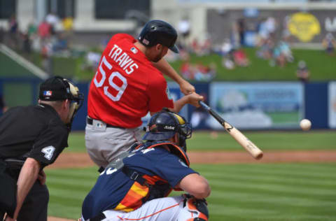 Mar 6, 2017; West Palm Beach, FL, USA; Boston Red Sox first baseman Sam Travis (59) hits a three run home run against the Houston Astros at The Ballpark of the Palm Beaches. Mandatory Credit: Jasen Vinlove-USA TODAY Sports