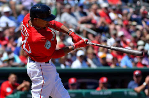 Mar 20, 2017; Fort Myers, FL, USA; Boston Red Sox right fielder Mookie Betts (50) doubles in a run against the Baltimore Orioles during a spring training game at JetBlue Park. Mandatory Credit: Jasen Vinlove-USA TODAY Sports