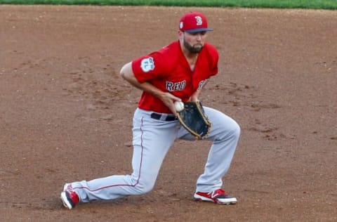 Mar 21, 2017; Tampa, FL, USA; Boston Red Sox first baseman Sam Travis (59) fields a ground ball hit by New York Yankees center fielder Jacoby Ellsbury (22) in the first inning of a baseball game during spring training at George M. Steinbrenner Field. Mandatory Credit: Butch Dill-USA TODAY Sports