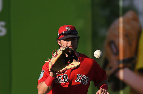 Mar 28, 2017; Bradenton, FL, USA; Boston Red Sox outfielder Andrew Benintendi (16) fields the ball in the first inning of the spring training game against the Pittsburgh Pirates at McKechnie Field. Mandatory Credit: Jonathan Dyer-USA TODAY Sports