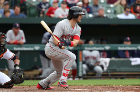 Apr 23, 2017; Baltimore, MD, USA; Boston Red Sox outfielder Andrew Benintendi (16) connects on his fifth hit of the game against the Baltimore Orioles at Oriole Park at Camden Yards. Mandatory Credit: Mitch Stringer-USA TODAY Sports