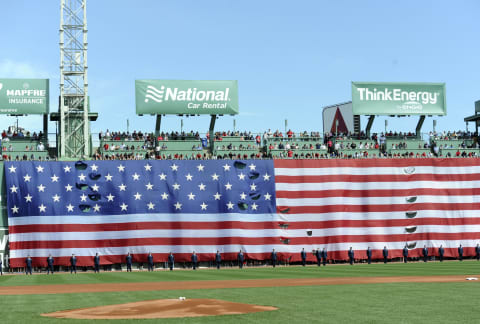 Apr 17, 2017; Boston, MA, USA; The US flag is draped over the center field wall during the national anthem prior to a game between the Boston Red Sox and the Tampa Bay Rays at Fenway Park. Mandatory Credit: Bob DeChiara-USA TODAY Sports