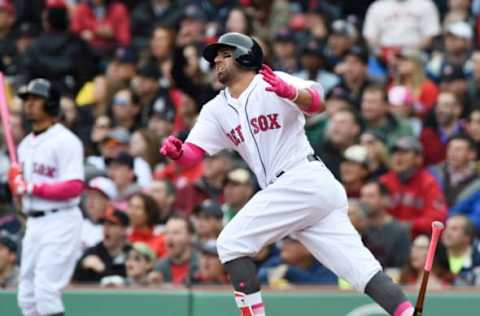 May 13, 2017; Boston, MA, USA; Boston Red Sox third baseman Deven Marrero (17) hits a RBI double during the fifth inning against the Tampa Bay Rays at Fenway Park. Mandatory Credit: Bob DeChiara-USA TODAY Sports