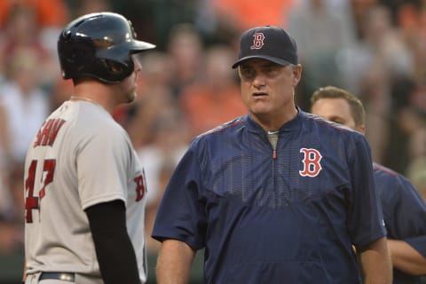 Aug 16, 2016; Baltimore, MD, USA; Boston Red Sox manager John Farrell (53) speaks with first baseman Travis Shaw (47) during the second inning against the Baltimore Orioles at Oriole Park at Camden Yards. Mandatory Credit: Tommy Gilligan-USA TODAY Sports