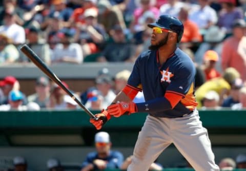 Mar 8, 2015; Lakeland, FL, USA; Houston Astros first baseman Jon Singleton (21) at bat against the Detroit Tigers at a spring training baseball game at Joker Marchant Stadium. Mandatory Credit: Kim Klement-USA TODAY Sports