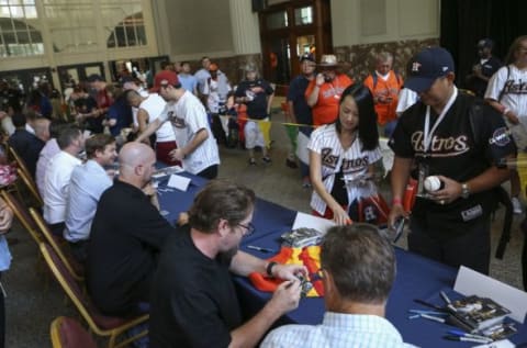 Aug 15, 2015; Houston, TX, USA; Former Houston Astros player Jeff Bagwell signs autographs for fans before a game against the Detroit Tigers at Minute Maid Park. Mandatory Credit: Troy Taormina-USA TODAY Sports