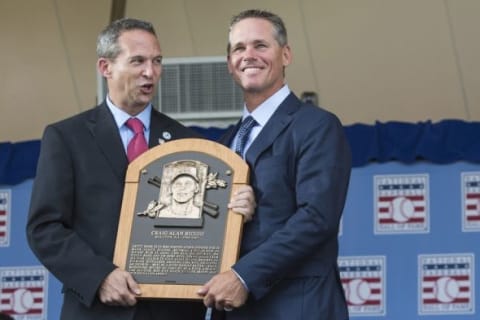 Jul 26, 2015; Cooperstown, NY, USA; Hall of Fame President Jeff Idelson (L) presents Hall of Fame Inductee Craig Biggio (R) with his Hall of Fame Plague during the Hall of Fame Induction Ceremonies at Clark Sports Center. Mandatory Credit: Gregory J. Fisher-USA TODAY Sports