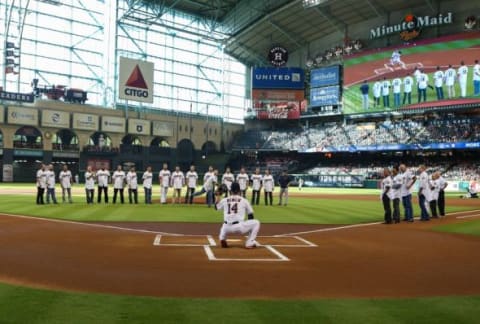 Aug 15, 2015; Houston, TX, USA; Houston Astros former manager Phil Garner throws out a ceremonial first pitch before a game against the Detroit Tigers at Minute Maid Park. Mandatory Credit: Troy Taormina-USA TODAY Sports