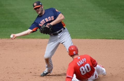 Mar 3, 2016; Clearwater, FL, USA; Houston Astros infielder Danny Worth (26) throws to first base as Philadelphia Phillies catcher Andrew Knapp (80) slides into second base in the third inning of the spring training game at Bright House Field. Mandatory Credit: Jonathan Dyer-USA TODAY Sports