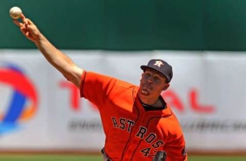 Apr 30, 2016; Oakland, CA, USA; Houston Astros staring pitcher Chris Devenski (47) throw to the Oakland Athletics in the first inning of their MLB baseball game at O.co Coliseum. Mandatory Credit: Lance Iversen-USA TODAY Sports.