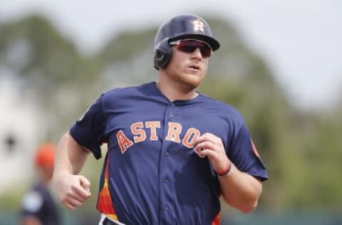 Mar 11, 2016; Kissimmee, FL, USA; Houston Astros first baseman A.J. Reed (80) runs to third base in the second inning of a spring training baseball game against the Detroit Tigers at Osceola County Stadium. Mandatory Credit: Reinhold Matay-USA TODAY Sports