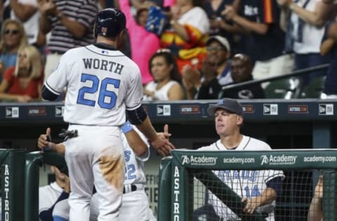 Jun 19, 2016; Houston, TX, USA; Houston Astros second baseman Danny Worth (26) celebrates with manager A.J. Hinch (14) after scoring a run during the second inning against the Cincinnati Reds at Minute Maid Park. Mandatory Credit: Troy Taormina-USA TODAY Sports