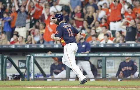 Jun 5, 2016; Houston, TX, USA; Houston Astros catcher Evan Gattis (11) rounds the bases after hitting a home run against the Oakland Athletics in the sixth inning at Minute Maid Park. Astros won 5 to 2. Mandatory Credit: Thomas B. Shea-USA TODAY Sports