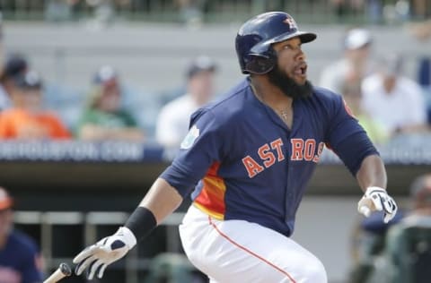 Mar 16, 2016; Kissimmee, FL, USA; Houston Astros designated hitter Jon Singleton (21) hits a two run double to right field during the sixth inning of a spring training baseball game against the Detroit Tigers at Osceola County Stadium. The Tigers won 7-3. Mandatory Credit: Reinhold Matay-USA TODAY Sports