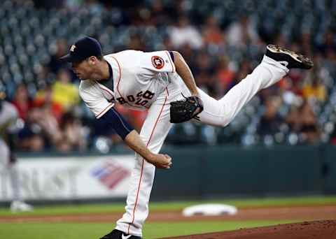 Jul 7, 2016; Houston, TX, USA; Houston Astros starting pitcher Doug Fister (58) reacts after walking a hitter during the second inning against the Oakland Athletics at Minute Maid Park. Mandatory Credit: Troy Taormina-USA TODAY Sports