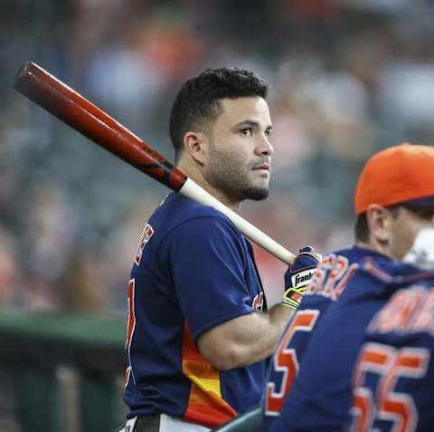 Jul 10, 2016; Houston, TX, USA; Houston Astros designated hitter Jose Altuve (27) watches from the dugout during the eighth inning against the Oakland Athletics at Minute Maid Park. Mandatory Credit: Troy Taormina-USA TODAY Sports