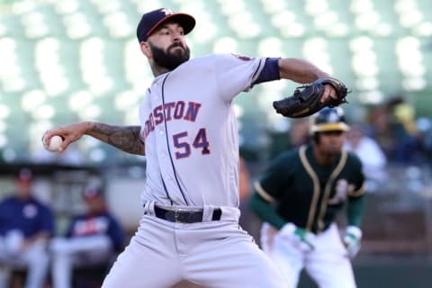 Jul 18, 2016; Oakland, CA, USA; Houston Astros starting pitcher Mike Fiers (54) throws to the Oakland Athletics in the first inning of their MLB baseball game at O.co Coliseum. Mandatory Credit: Lance Iversen-USA TODAY Sports