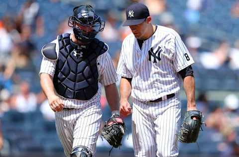 Jul 24, 2016; Bronx, NY, USA; New York Yankees catcher Brian McCann (34) talks to New York Yankees starting pitcher 