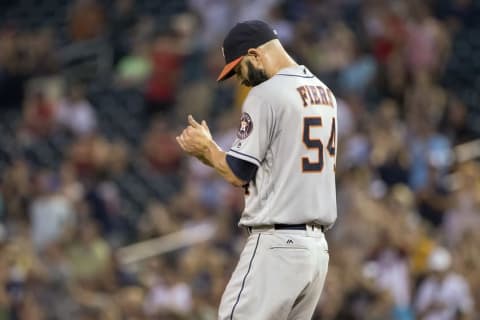 Aug 9, 2016; Minneapolis, MN, USA; Houston Astros starting pitcher Mike Fiers (54) looks down after giving up back to back home runs in the fifth inning against the Minnesota Twins at Target Field. Mandatory Credit: Jesse Johnson-USA TODAY Sports