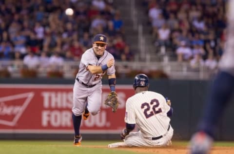 Aug 10, 2016; Minneapolis, MN, USA; Minnesota Twins designated hitter Miguel Sano (22) is out at second as Houston Astros second baseman Jose Altuve (27) tries to turn the double in the first inning at Target Field. Mandatory Credit: Brad Rempel-USA TODAY Sports