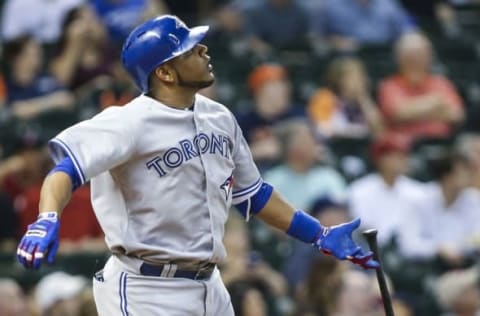 May 14, 2015; Houston, TX, USA; Toronto Blue Jays first baseman Edwin Encarnacion (10) hits a home run during the first inning against the Houston Astros at Minute Maid Park. Mandatory Credit: Troy Taormina-USA TODAY Sports