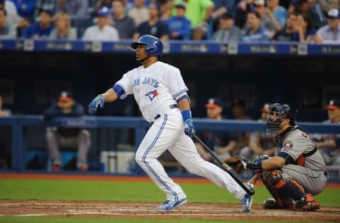 Jun 5, 2015; Toronto, Ontario, CAN; Toronto Blue Jays designated hitter Edwin Encarnacion (10) batting against Houston Astros in the third inning at Rogers Centre. Mandatory Credit: Peter Llewellyn-USA TODAY Sports