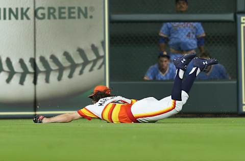 HOUSTON, TX – AUGUST 10: Jake Marisnick #6 of the Houston Astros makes a diving catch on a line drive by Kyle Seager #15 of the Seattle Mariners in the sixth inning at Minute Maid Park on August 10, 2018 in Houston, Texas. (Photo by Bob Levey/Getty Images)