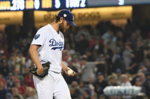 LOS ANGELES, CA – OCTOBER 28: Clayton Kershaw #22 of the Los Angeles Dodgers reacts after allowing a sixth inning home run to Mookie Betts (not pictured) #50 of the Boston Red Sox in Game Five of the 2018 World Series at Dodger Stadium on October 28, 2018 in Los Angeles, California. (Photo by Harry How/Getty Images)