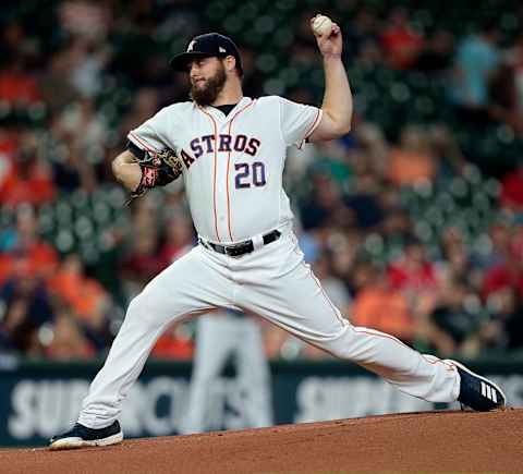 HOUSTON, TEXAS – MAY 09: Wade Miley #20 of the Houston Astros strikes out Joey Gallo #13 of the Texas Rangers in the second inning was his 1000th career strike out at Minute Maid Park on May 09, 2019 in Houston, Texas. (Photo by Bob Levey/Getty Images)