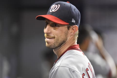 MIAMI, FL – JUNE 25: Max Scherzer #31 of the Washington Nationals smiles in the dugout after pitching eight innings against the Miami Marlins at Marlins Park on June 25, 2019 in Miami, Florida. (Photo by Eric Espada/Getty Images)