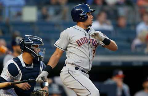 NEW YORK, NEW YORK – JUNE 20: Michael Brantley #23 of the Houston Astros follows through on a third inning infield single against the New York Yankees at Yankee Stadium on June 20, 2019 in the Bronx borough of New York City. (Photo by Jim McIsaac/Getty Images)