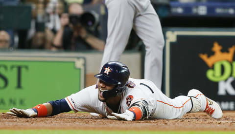 HOUSTON, TEXAS – JULY 23: Yuli Gurriel #10 of the Houston Astros scores in the second inning on his inside-the-park home run against the Oakland Athletics at Minute Maid Park on July 23, 2019 in Houston, Texas. (Photo by Bob Levey/Getty Images)