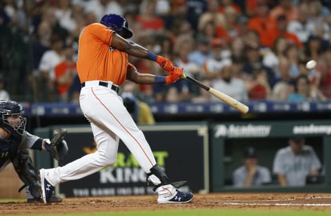 HOUSTON, TEXAS – AUGUST 02: Yordan Alvarez #44 of the Houston Astros hits a home run to center field in the second inning against the Seattle Mariners at Minute Maid Park on August 02, 2019 in Houston, Texas. (Photo by Bob Levey/Getty Images)