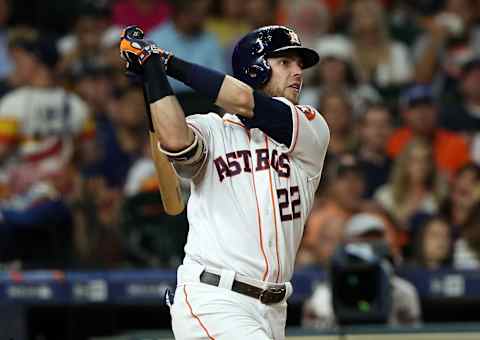 HOUSTON, TEXAS – SEPTEMBER 05: Josh Reddick #22 of the Houston Astros hits a home run in the sixth inning against the Seattle Mariners at Minute Maid Park on September 05, 2019 in Houston, Texas. (Photo by Bob Levey/Getty Images)