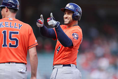 ANAHEIM, CALIFORNIA – SEPTEMBER 29: George Springer #4 of the Houston Astros celebrates on first base after a hit in the first inning against the Los Angeles Angels of Anaheim at Angel Stadium of Anaheim on September 29, 2019 in Anaheim, California. (Photo by Kent Horner/Getty Images)