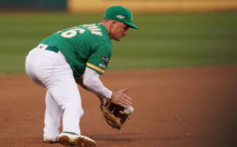 OAKLAND, CALIFORNIA – OCTOBER 02: Matt Chapman #26 of the Oakland Athletics fields a ground ball during the American League Wild Card Game against the Tampa Bay Rays at RingCentral Coliseum on October 02, 2019 in Oakland, California. (Photo by Thearon W. Henderson/Getty Images)