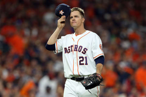 HOUSTON, TEXAS – OCTOBER 12: Zack Greinke #21 of the Houston Astros reacts after the top of the fourth inning against the New York Yankees in game one of the American League Championship Series at Minute Maid Park on October 12, 2019 in Houston, Texas. (Photo by Bob Levey/Getty Images)