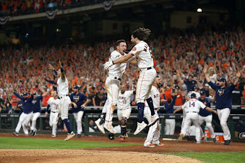 HOUSTON, TEXAS – OCTOBER 19: The Houston Astros celebrate their 6-4 win against the New York Yankees on a ninth inning walk-off home run by Jose Altuve (not pictured) in game six of the American League Championship Series at Minute Maid Park on October 19, 2019 in Houston, Texas. (Photo by Bob Levey/Getty Images)