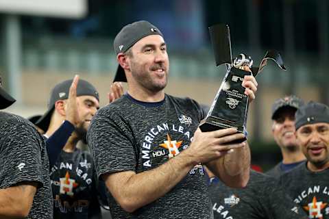 HOUSTON, TEXAS – OCTOBER 19: Justin Verlander #35 of the Houston Astros celebrates with the trophy following his teams 6-4 win against the New York Yankees in game six of the American League Championship Series at Minute Maid Park on October 19, 2019 in Houston, Texas. (Photo by Bob Levey/Getty Images)