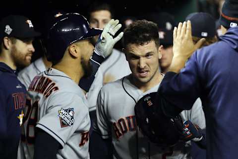 WASHINGTON, DC – OCTOBER 26: Alex Bregman #2 of the Houston Astros is congratulated by his teammates after hitting a grand slam home run against the Washington Nationals during the seventh inning in Game Four of the 2019 World Series at Nationals Park on October 26, 2019 in Washington, DC. (Photo by Patrick Smith/Getty Images)