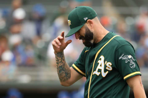 MESA, ARIZONA – MARCH 10: Starting pitcher Mike Fiers #50 of the Oakland Athletics walks to the dugout during the second inning of the MLB spring training game against the Kansas City Royals at HoHoKam Stadium on March 10, 2020 in Mesa, Arizona. (Photo by Christian Petersen/Getty Images)