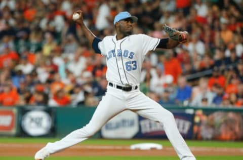 HOUSTON, TX – JUNE 17: David Paulino #63 of the Houston Astros pitches in the first inning against the Boston Red Sox at Minute Maid Park on June 17, 2017 in Houston, Texas. (Photo by Bob Levey/Getty Images)