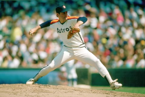 CHICAGO – 1988: Nolan Ryan of the Houston Astros pitches during an MLB game against the Chicago Cubs at Wrigley Field in Chicago, Illinois during the 1988 season. (Photo by Ron Vesely/MLB Photos via Getty Images)