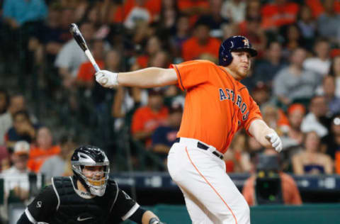 HOUSTON, TX – JULY 01: A.J. Reed #23 of the Houston Astros singles for his first major league hit in the fifth inning against the Chicago White Sox at Minute Maid Park on July 1, 2016, in Houston, Texas. (Photo by Bob Levey/Getty Images)