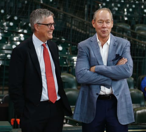 HOUSTON, TX – JUNE 30: Houston Astros owner Jim Crane, right, and Houston general manager Jeff Luhnow chat during batting practice at Minute Maid Park on June 30, 2017, in Houston, Texas. (Photo by Bob Levey/Getty Images)