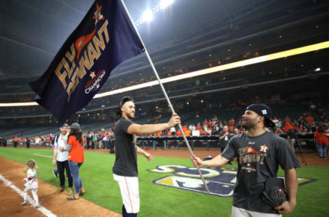 HOUSTON, TX – OCTOBER 21: Springer #4 and Altuve #27 of the Houston Astros celebrate after defeating the New York Yankees by a score of 4-0 to win Game Seven of the American League Championship Series at Minute Maid Park on October 21, 2017 in Houston, Texas. The Houston Astros advance to face the Los Angeles Dodgers in the World Series. (Photo by Ronald Martinez/Getty Images)