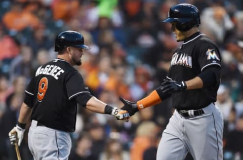 SAN FRANCISCO, CA – MAY 17: Giancarlo Stanton #27 of the Miami Marlins is congratulated by Casey McGehee #9 after Stanton hit a solo home run against the San Francisco Giants in the top of the seventh inning at AT&T Park on May 17, 2014 in San Francisco, California. (Photo by Thearon W. Henderson/Getty Images)