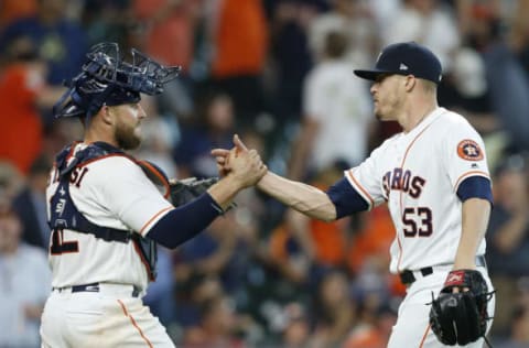 HOUSTON, TX – APRIL 25: Ken Giles #53 of the Houston Astros shakes hands with Max Stassi #12 after the final out against the Los Angeles Angels of Anaheim at Minute Maid Park on April 25, 2018 in Houston, Texas. (Photo by Bob Levey/Getty Images)