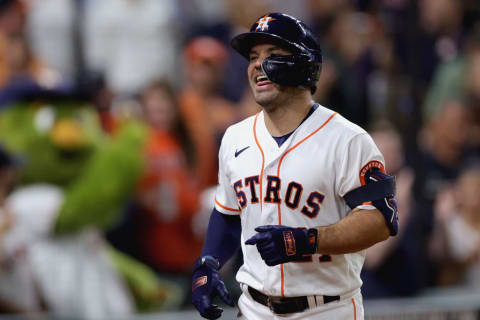 Jose Altuve #27 of the Houston Astros reacts after hitting a home run during the sixth inning against the Arizona Diamondbacks at Minute Maid Park on September 27, 2022 in Houston, Texas. (Photo by Carmen Mandato/Getty Images)