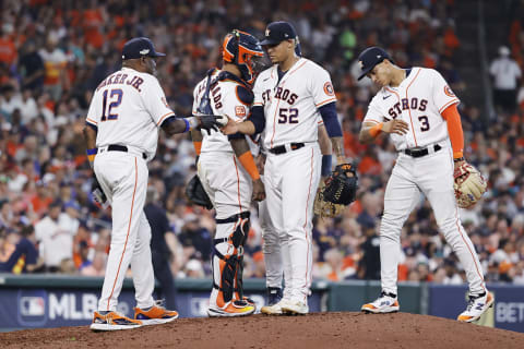 HOUSTON, TEXAS – OCTOBER 11: Bryan Abreu #52 of the Houston Astros is removed from the game against the Seattle Mariners by manager Dusty Baker Jr. #12 during the sixth inning in game one of the American League Division Series at Minute Maid Park on October 11, 2022 in Houston, Texas. (Photo by Bob Levey/Getty Images)